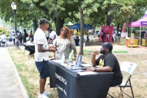 Clinton talking to Roland Hillockh, Joyce Loman from Primerica