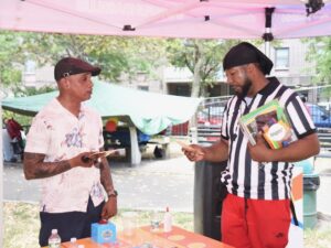 Clinton talking with Jevante from FunBash